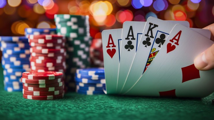 Live dealer revealing Dragon Tiger cards at bintang11.com table
